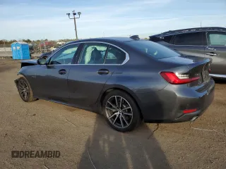 2021 BMW 3 Series 330i with VIN 3MW5R1J09M8C11559, listed as a Copart auction lot 71720262 with 36,950 mi miles. Bid and sale history available at carsss.com. Image 2.