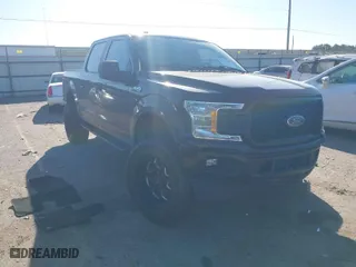 2018 Ford F-150 XL with VIN 1FTEW1CP8JKC49400, listed as a IAAI auction lot 41712598 with 103,017 mi miles. Bid and sale history available at carsss.com. Image 1.
