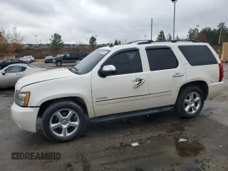 2013 Chevrolet Tahoe LTZ with VIN 1GNSCCE0XDR228364, listed as a Copart auction lot 83389914 with 231,966 mi miles and Salvage title. Bid and sale history available at DreamBid. Image 1.