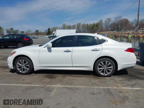 2013 Infiniti M z VIN JN1BY1AR3DM600744, wystawiony jako IAAI lot #41912310 z przebiegiem 200 014 mil mil oraz . Historia ofert i sprzedaży dostępna na DreamBid. Obrazek 14.