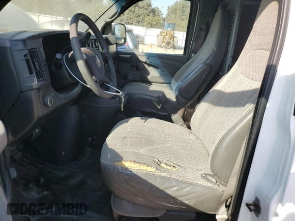 2010 Chevrolet Express Cargo with VIN 1GCZGFBA3A1166374, listed as a Copart auction lot 74968214 with 201,958 mi miles and Salvage title. Bid and sale history available at DreamBid. Image 7.