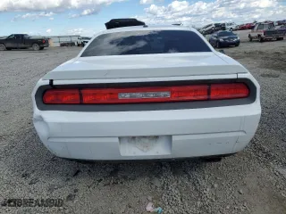 2012 Dodge Challenger SXT Plus with VIN 2C3CDYAG7CH128168, listed as a Copart auction lot 47273945 with 196,025 mi miles and Salvage Title. Bid and sale history available at carsss.com. Image 6.