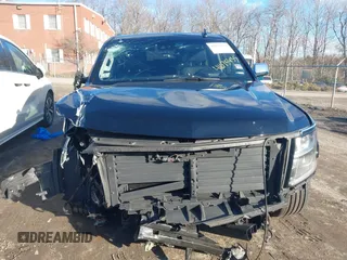 2019 Chevrolet Suburban Premier with VIN 1GNSKJKCXKR111502, listed as a IAAI auction lot 41075435 with 134,555 mi miles and . Bid and sale history available at DreamBid. Image 12.