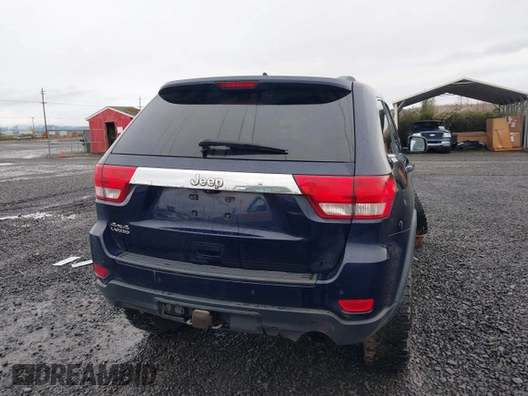 2012 Jeep Grand Cherokee Laredo with VIN 1C4RJFAG9CC220145, listed as a IAAI auction lot 41798457 with 130,603 mi miles. Bid and sale history available at carsss.com. Image 16.
