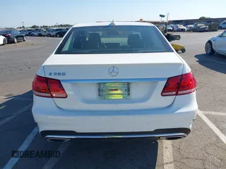 2014 Mercedes-Benz E 350 Sport with VIN WDDHF5KB9EA934467, listed as a IAAI auction lot 42773452 with 168,416 mi miles and . Bid and sale history available at DreamBid. Image 16.