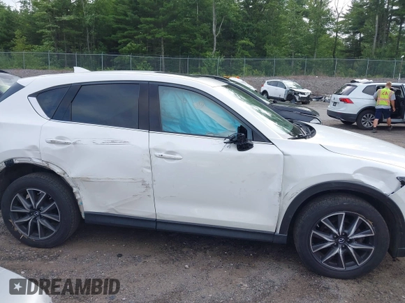 2018 Mazda CX-5 Grand Touring with VIN JM3KFBDM0J0308813, listed as a IAAI auction lot 42657978 with 78,119 mi miles and . Bid and sale history available at DreamBid. Image 14.