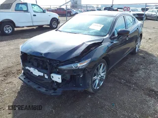 2021 Mazda 6 Signature with VIN JM1GL1XY7M1615149, listed as a IAAI auction lot 41851158 with 47,690 mi miles and . Bid and sale history available at DreamBid. Image 19.