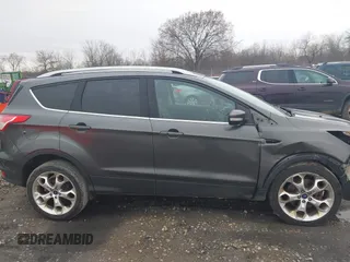 2015 Ford Escape Titanium with VIN 1FMCU9J94FUB49236, listed as a IAAI auction lot 42117378 with 112,267 mi miles. Bid and sale history available at carsss.com. Image 14.