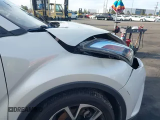 2019 Toyota C-HR XLE with VIN JTNKHMBX4K1040772, listed as a IAAI auction lot 41812031 with 79,729 mi miles. Bid and sale history available at carsss.com. Image 19.