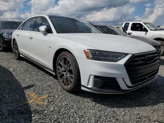 2021 Audi A8 with VIN WAU8DAF81MN011833, listed as a Copart auction lot 74031874 with 53,125 mi miles and Non Repairable. Bid and sale history available at carsss.com. Image 4.