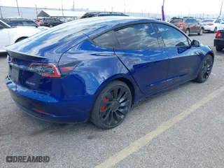 2022 Tesla Model 3 Performance with VIN 5YJ3E1EC1NF296758, listed as a IAAI auction lot 41960443 with 30,754 mi miles. Bid and sale history available at carsss.com. Image 4.