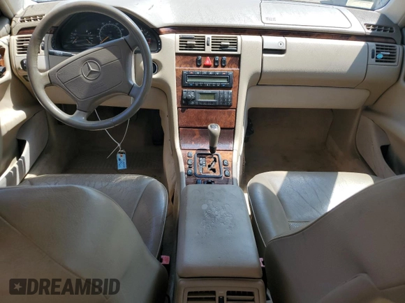 1999 Mercedes-Benz E-Class with VIN WDBJF65H2XA796208, listed as a Copart auction lot 62738904 with 156,283 mi miles and Salvage Title. Bid and sale history available at carsss.com. Image 8.