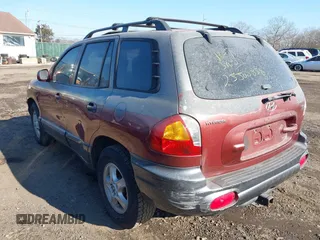 2004 Hyundai Santa Fe GLS with VIN KM8SC13E34U708007, listed as a IAAI auction lot 41414729 with 999,999 mi miles. Bid and sale history available at carsss.com. Image 3.