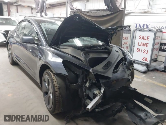 2023 Tesla Model 3 with VIN 5YJ3E1EAXPF669538, listed as a IAAI auction lot 40329679 with 16,612 mi miles and . Bid and sale history available at DreamBid. Image 1.