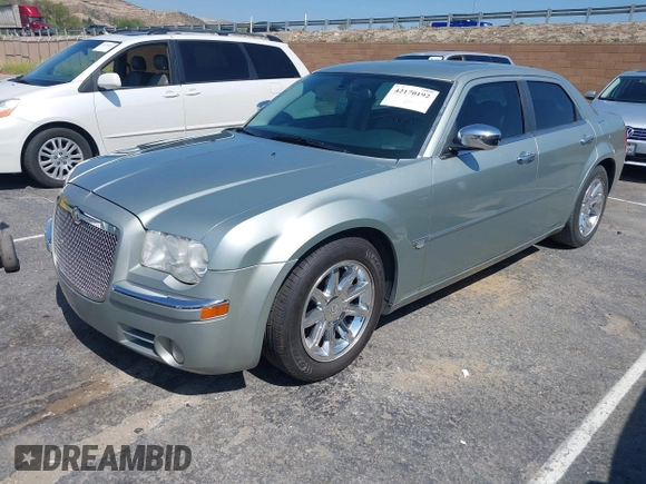 2006 Chrysler 300 C with VIN 2C3LA63H26H130160, listed as a IAAI auction lot 42170192 with 124,206 mi miles. Bid and sale history available at carsss.com. Image 2.