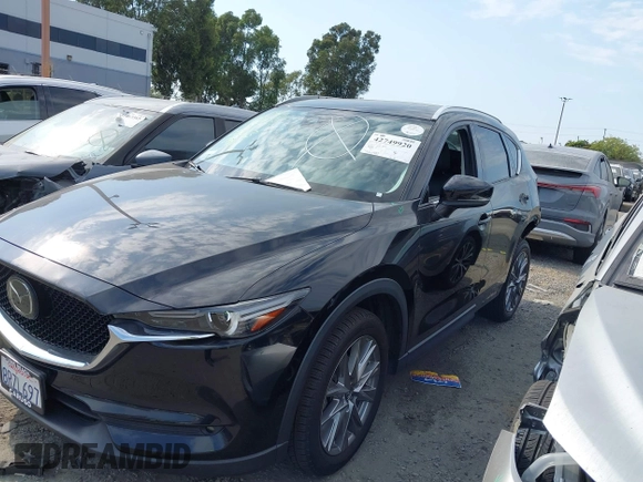 2020 Mazda CX-5 Grand Touring with VIN JM3KFADM3L1819939, listed as a IAAI auction lot 42749920 with 35,407 mi miles and . Bid and sale history available at DreamBid. Image 22.