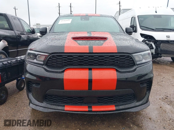 2023 Dodge Durango SRT Hellcat Premium with VIN 1C4SDJH99PC584770, listed as a IAAI auction lot 41562157 with 14,598 mi miles and . Bid and sale history available at DreamBid. Image 12.
