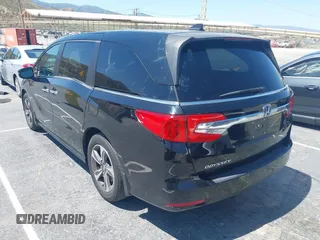 2018 Honda Odyssey Touring with VIN 5FNRL6H8XJB026247, listed as a IAAI auction lot 42298961 with 66,571 mi miles and . Bid and sale history available at DreamBid. Image 3.