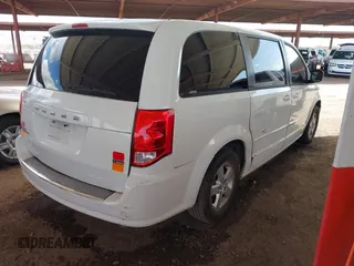 2012 Dodge Grand Caravan SE with VIN 2C4RDGBGXCR407641, listed as a IAAI auction lot 41950812 with 151,331 mi miles and . Bid and sale history available at DreamBid. Image 4.