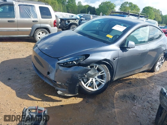 2023 Tesla Model Y Long Range with VIN 7SAYGDEE2PF674286, listed as a IAAI auction lot 42010275 with Not Provided miles and . Bid and sale history available at carsss.com. Image 17.