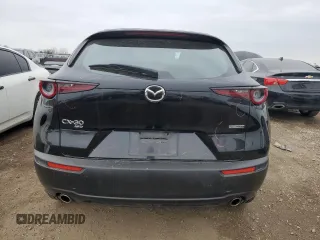 2023 Mazda CX-30 S with VIN 3MVDMBAM6PM549095, listed as a Copart auction lot 53027665 with 53,804 mi miles and Salvage title. Bid and sale history available at DreamBid. Image 6.