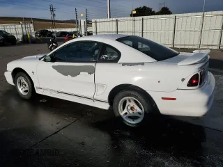 1997 Ford Mustang with VIN 1FALP4045VF120213, listed as a Copart auction lot 85335614 with 71,225 mi miles and Salvage Title. Bid and sale history available at carsss.com. Image 2.