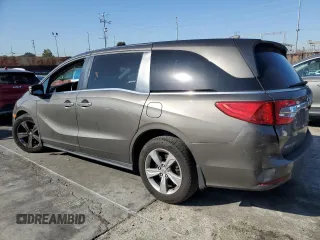 2018 Honda Odyssey EX-L with VIN 5FNRL6H78JB003220, listed as a Copart auction lot 48493355 with 127,807 mi miles and Salvage Title. Bid and sale history available at carsss.com. Image 2.
