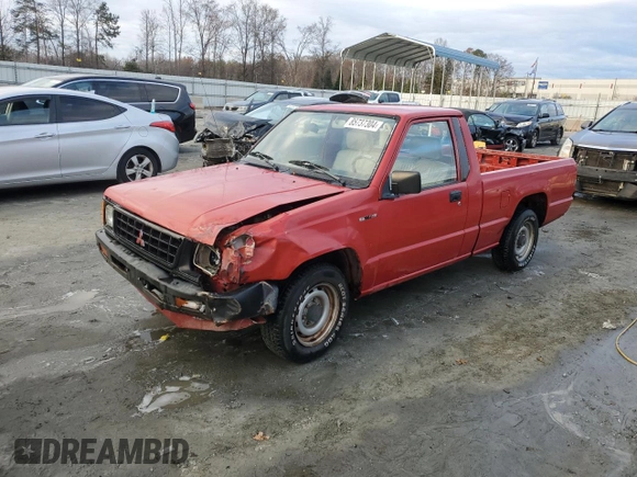 1991 Mitsubishi Mighty Max z VIN JA7FL24W3MP017705, wystawiony jako Copart lot #85737304 z przebiegiem 261 896 mil mil oraz Szkody całkowita. Historia ofert i sprzedaży dostępna na DreamBid. Obrazek 1.