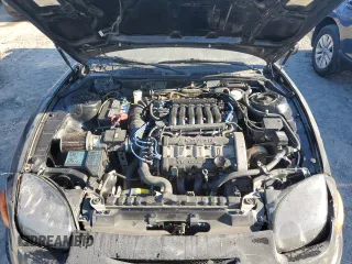 1995 Mitsubishi 3000GT GT z VIN JA3AM84J4SY001469, wystawiony jako Copart lot #75180794 z przebiegiem 198 490 mil mil oraz Szkody całkowita. Historia ofert i sprzedaży dostępna na DreamBid. Obrazek 11.