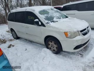 2012 Dodge Grand Caravan SE with VIN 2C4RDGBG2CR419489, listed as a IAAI auction lot 41270114 with 124,869 mi miles. Bid and sale history available at carsss.com. Image 1.
