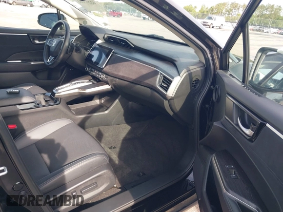 2021 Honda Clarity Touring z VIN JHMZC5F3XMC001253, wystawiony jako IAAI lot #42212102 z przebiegiem 35 649 mil mil oraz . Historia ofert i sprzedaży dostępna na DreamBid. Obrazek 5.