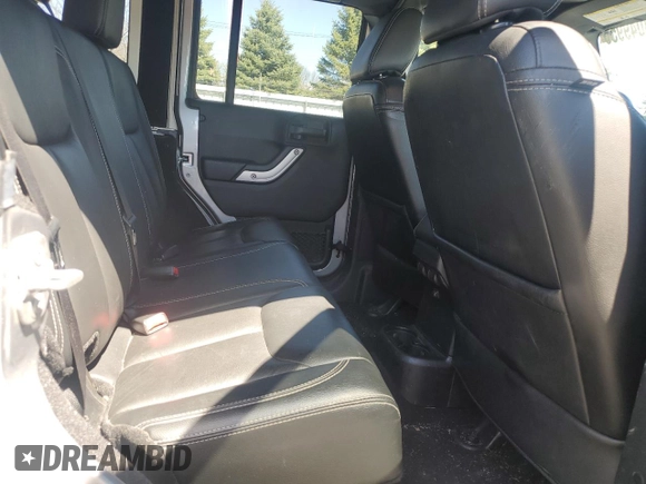 2015 Jeep Wrangler Unlimited Rubicon Hard Rock with VIN 1C4HJWFG2FL686556, listed as a Copart auction lot 54049955 with 126,675 mi miles and Salvage title. Bid and sale history available at DreamBid. Image 11.