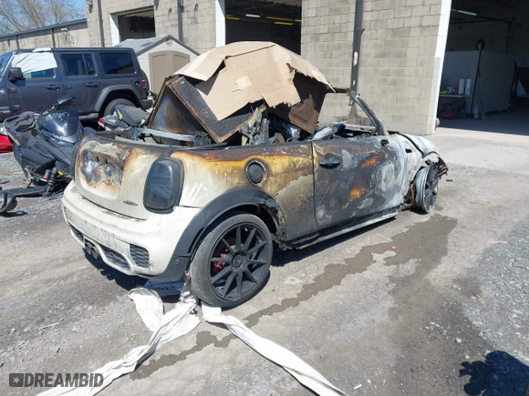 2017 MINI Convertible John Cooper Works with VIN WMWWH9C31H3A78648, listed as a IAAI auction lot 41804606 with 47,961 mi miles. Bid and sale history available at carsss.com. Image 4.