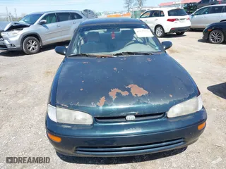 1997 Geo Prizm with VIN 1Y1SK5268VZ462502, listed as a IAAI auction lot 41929276 with 243,149 mi miles. Bid and sale history available at carsss.com. Image 6.