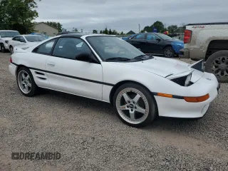 1991 Toyota MR2 z VIN JT2SW21N2M0010699, wystawiony jako Copart lot #70027794 z przebiegiem 136 755 mil mil oraz Szkody całkowita. Historia ofert i sprzedaży dostępna na DreamBid. Obrazek 4.