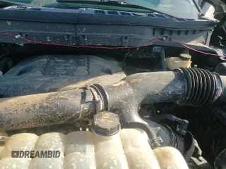 2022 Ford F-150 XL с VIN 1FTEW1E83NFA00703, выставлен на аукционе Copart как лот 85178715 с пробегом 98 584 миль миль и Списание • Salvage title. История ставок и продаж доступна на DreamBid. Изображение 14.