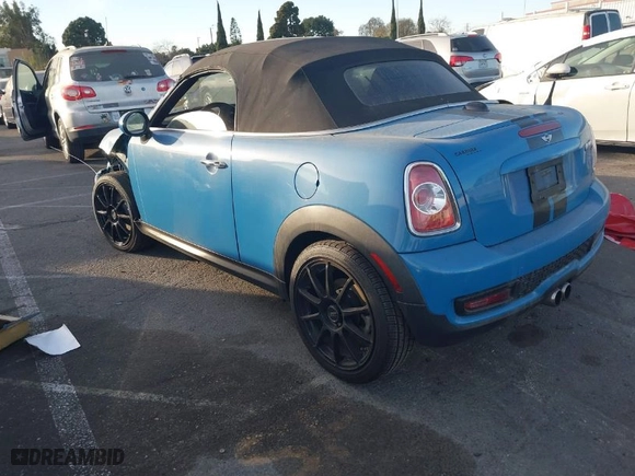 2013 MINI Cooper Roadster S with VIN WMWSY3C55DT594628, listed as a IAAI auction lot 41316950 with NaN miles. Bid and sale history available at carsss.com. Image 3.