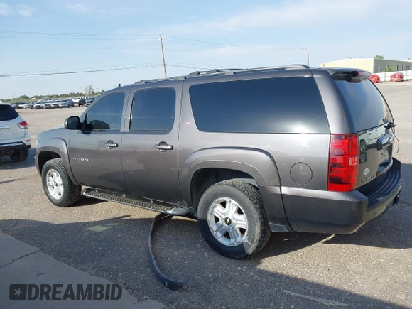 2011 Chevrolet Suburban LT with VIN 1GNSKJE34BR242629, listed as a IAAI auction lot 42043276 with 197,722 mi miles and . Bid and sale history available at DreamBid. Image 14.