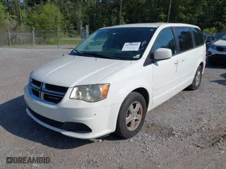 2013 Dodge Grand Caravan SXT with VIN 2C4RDGCG3DR537051, listed as a IAAI auction lot 41919188 with 180,524 mi miles. Bid and sale history available at carsss.com. Image 2.