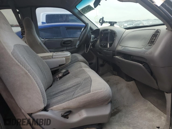 1999 Ford F-150 с VIN 2FTZX1729XCA25031, выставлен на аукционе Copart как лот 46941615 с пробегом 310 800 миль миль и Списание • Salvage title. История ставок и продаж доступна на DreamBid. Изображение 7.