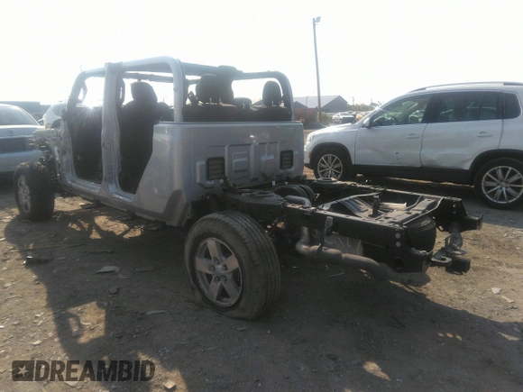 2022 Jeep Gladiator Willys with VIN 1C6HJTAG0NL131004, listed as a IAAI auction lot 40307060 with Not provided miles and . Bid and sale history available at DreamBid. Image 3.