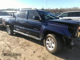 2005 Toyota Tacoma PreRunner with VIN 3TMKU72N65M004086, listed as a IAAI auction lot 41812560 with 205,099 mi miles and . Bid and sale history available at DreamBid. Image 1.