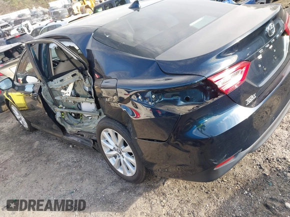 2019 Toyota Camry LE z VIN 4T1B11HK0KU759885, wystawiony jako IAAI lot #41684709 z przebiegiem 80 417 mil mil oraz . Historia ofert i sprzedaży dostępna na DreamBid. Obrazek 3.
