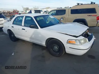 2000 Ford Crown Victoria Police Police Interceptor with VIN 2FAFP71W9YX149303, listed as a IAAI auction lot 41888402 with 148,081 mi miles. Bid and sale history available at carsss.com. Image 1.