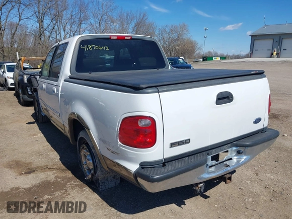 2003 Ford F-150 XLT with VIN 1FTRW07663KD57580, listed as a IAAI auction lot 41870643 with 256,497 mi miles. Bid and sale history available at carsss.com. Image 3.
