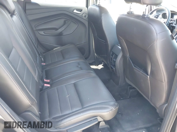 2014 Ford Escape SE z VIN 1FMCU9G97EUB64559, wystawiony jako IAAI lot #42238726 z przebiegiem 124 633 mil mil oraz . Historia ofert i sprzedaży dostępna na DreamBid. Obrazek 8.