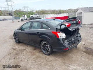 2012 Ford Focus Titanium with VIN 1FAHP3J2XCL369554, listed as a IAAI auction lot 42072931 with 95,474 mi miles. Bid and sale history available at carsss.com. Image 3.