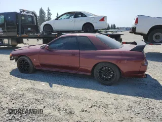 1990 Nissan Skyline z VIN BNR32011442, wystawiony jako Copart lot #64651064 z przebiegiem 118 579 mil mil oraz Czysty tytuł • Clean title. Historia ofert i sprzedaży dostępna na DreamBid. Obrazek 2.