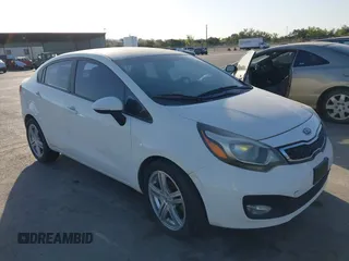2012 Kia Rio EX z VIN KNADN4A35C6093602, wystawiony jako IAAI lot #41872556 z przebiegiem 123 526 mil mil oraz . Historia ofert i sprzedaży dostępna na DreamBid. Obrazek 1.