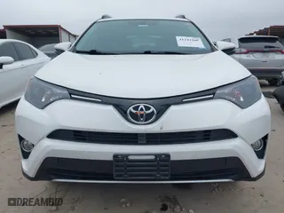2016 Toyota RAV4 XLE with VIN 2T3WFREV8GW259777, listed as a IAAI auction lot 41241266 with 129,122 mi miles. Bid and sale history available at carsss.com. Image 12.